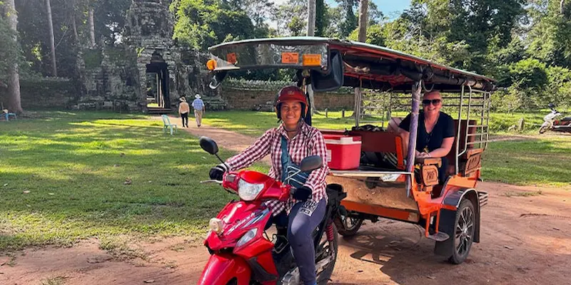 Tuk tuk driver ready to go
